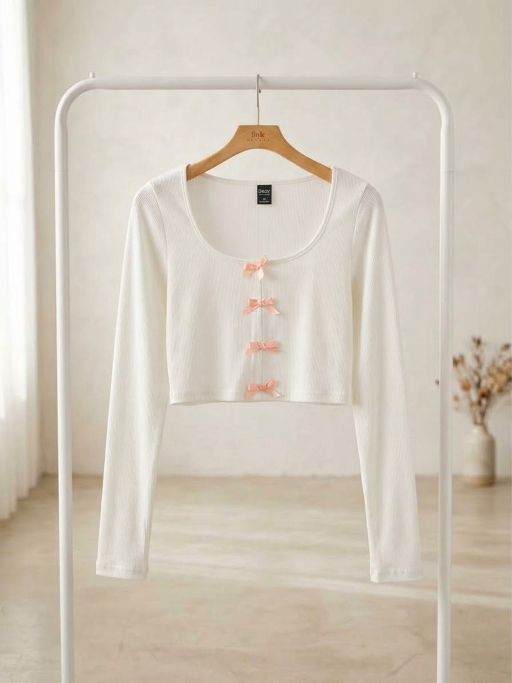 White Ribbed Long-Sleeve Crop Top with Pink Bows